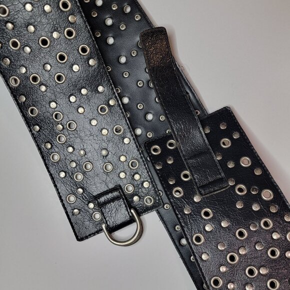Black Wide Faux Leather Belt Embellished with Silver Toned Eyelet Grommets - Picture 2 of 3